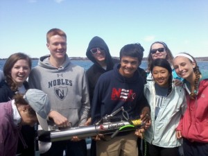 Nobles students holding the side scan sonar